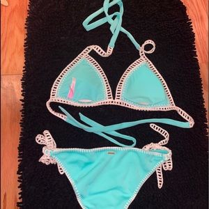 two piece bathing suit turquoise with crocheted cream trimMedium topsmall bottom